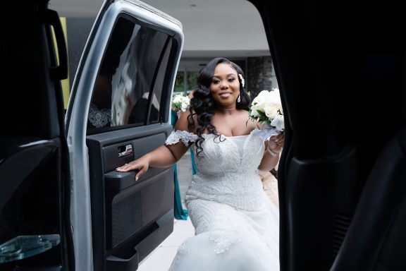 bride getting into limo